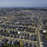APRA mulls tougher curbs to rein in housing boom