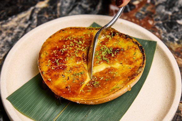 Mango brulee with coconut rice is one of So’s first dishes at Etta.