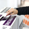 A person casts their referendum vote during election day on October 17.