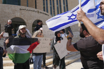 Protesters gather in support of Mohammed el-Halabi after the verdict. 