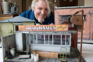 David Hourigan with his model of the late, much loved Olympic Doughnuts van that stood outside Footscray station.