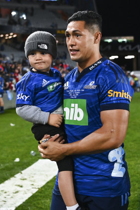 Roger Tuivasa-Sheck of the Blues and his son after the Super Rugby final.