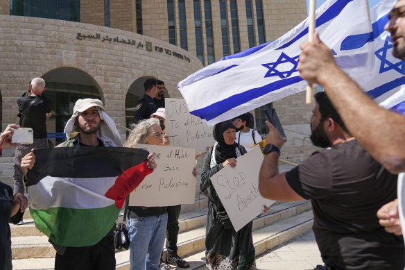 Protesters gather in support of Mohammed el-Halabi after the verdict. 