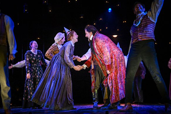 Claire Warrillow and Lachy Hulme in a scene from the 2025 season of A Christmas Carol.