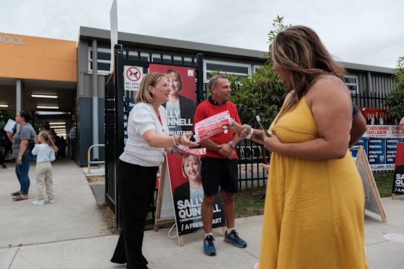 Labor candidate for Camden Sally Quinnell handing out at Spring Farm Public School, with upper house MP Mark Buttigieg.