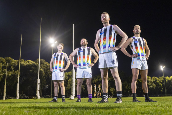 West Brunswick Football Club players James Gibson, David Cudmore, Evan Lloyd and Thomas Zafiropoulos wearing the club’s pride jumper.