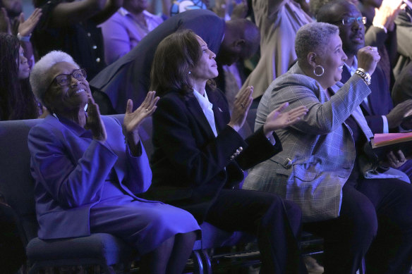 Kamala Harris (centre) applauds alongside former congresswoman Eva Clayton (left) and Bishop Rosie O’Neal, during a church service at Koinonia Christian Centre in Greenville, North Carolina, on Sunday.