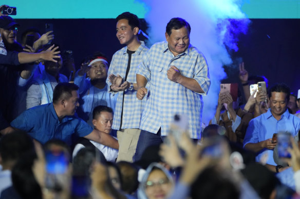 Indonesia’s Prabowo Subianto (right) and his running mate, Gibran Rakabuming Raka, (Joko Widodo’s son) at a post-election party. TikTok helped the strongman dance his way to the presidential palace.