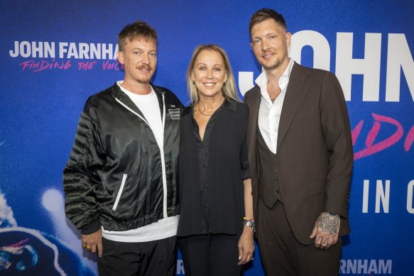 Gaynor Wheatley with James and Rob Farnham at the Melbourne premiere of John Farnham: Finding the Voice.
