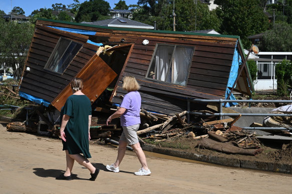 Part of a house is washed up onto Koloona Avenue in Mount Kiera, Wollongong