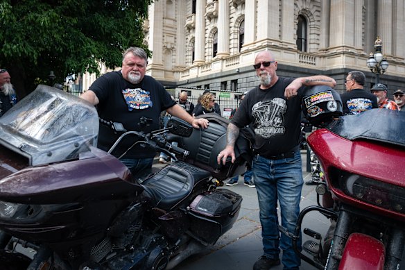 Paul Povh (left) and Michael White outside parliament on Monday.