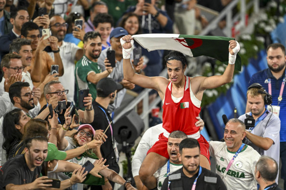 Imane Khelif celebrates winning the gold medal  in Paris.