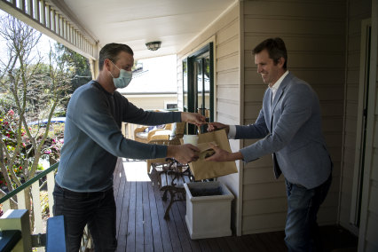 Kickaboom cafe delivers a meal to Steve Baird at his Glenbrook home.