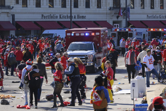 Police clear the area following a shooting at the Kansas City Chiefs NFL football Super Bowl celebration.