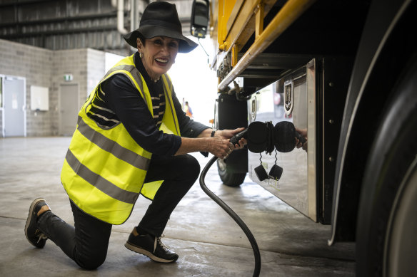 Sydney Lord Mayor Clover Moore with one of the council’s EV trucks. A council report found the biggest barriers to using electric vehicles were affordability, availability and
access to charging.