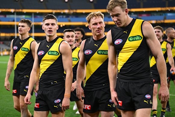 Dejected Tigers after another loss and a mounting injury list. 