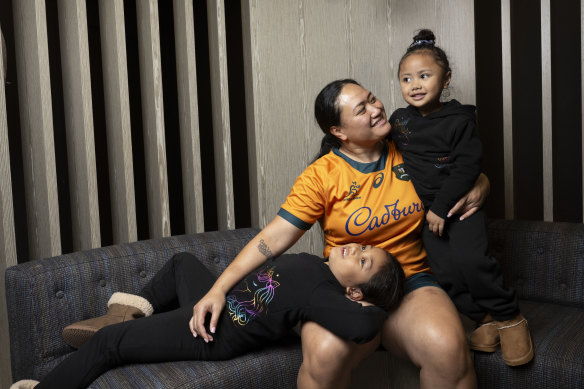 Wallaroos player Sally Fuesaina with her two children, Athena, 6, and Luna, 4.