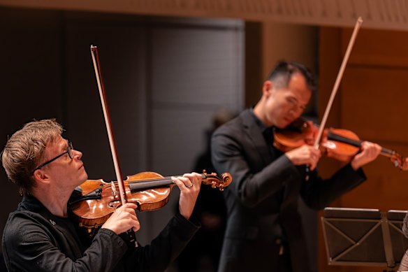 Pekka Kuusisto (left) performs with the Australian Chamber Orchestra.