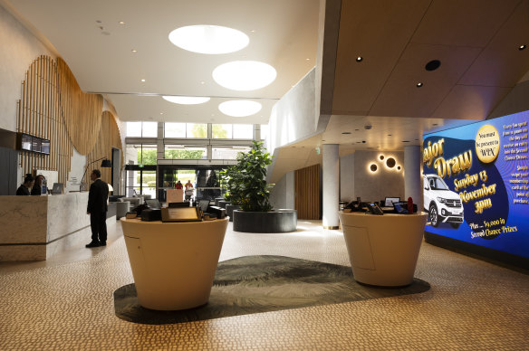 Foyer of the Campbelltown Catholic Club reminds patron Mary Medina of a fancy hotel.