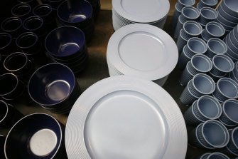 Biodegradable plastic dinner plates and cups on display at Merci, a concept shop in Paris.