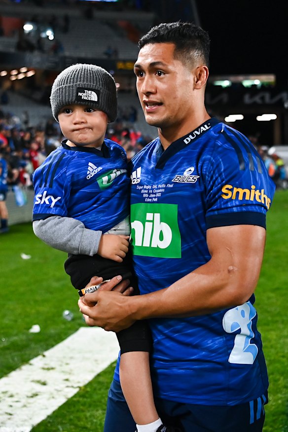 Roger Tuivasa-Sheck of the Blues and his son after the Super Rugby final.