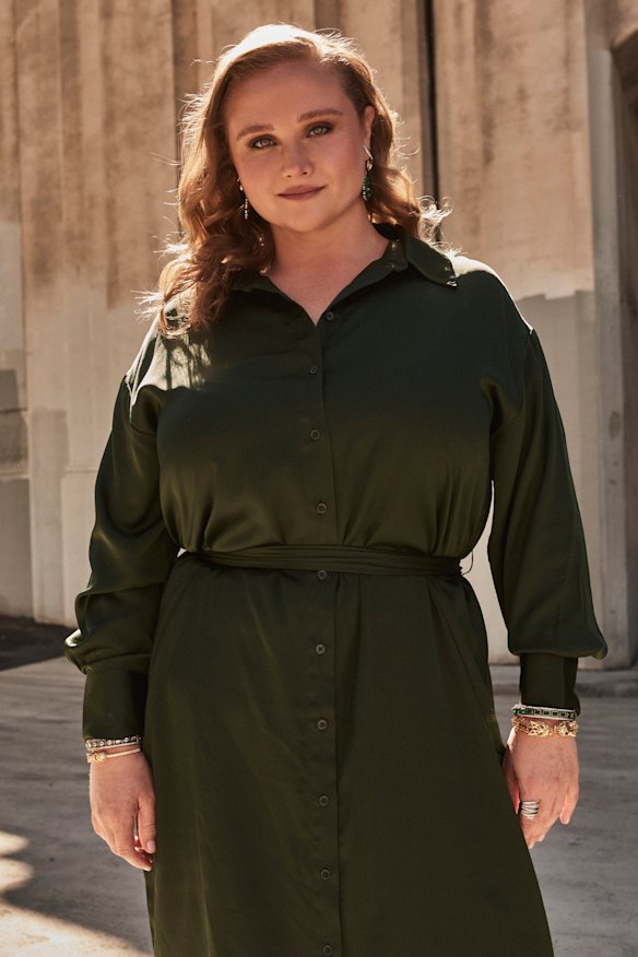 Danielle wears Eloquii shirt dress; Meme London “Twinkle and Shine” necklace; Coco Tay Jewelry earrings and bracelets.