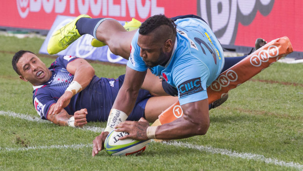 Inside the chalk: Taqele Naiyaravoro adds to the Rebels' pain with another score.