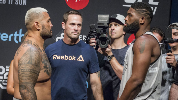 Mark Hunt (left) and Curtis Blaydes face off during the UFC 221 weigh-ins at Perth Arena on Saturday.