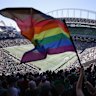 A Pride flag is waved at Seattle’s Lumen Field during a Major League Soccer match between the Seattle Sounders and Portland Timbers.