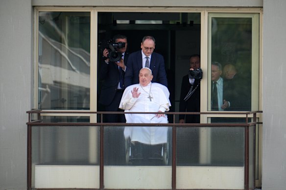 Pope Francis appears on his balcony to speak to the crowds at the Gemelli hospital on March 23, the first time he had appeared in public since being admitted to hospital on February 14, 2025.
