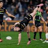 Dylan Edwards does a cartwheel after scoring a try.