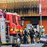 A fire under a railway bridge in West Melbourne has disrupted train services.
