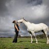 Veterinary nurse Molly Stewart with retired racehorse Chautauqua at Living Legends.