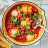  Danielle Alvarez's tomato and basil poached eggs with crusty bread.