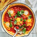 Danielle Alvarez’ tomato and basil poached eggs with crusty bread.