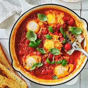  Danielle Alvarez's tomato and basil poached eggs with crusty bread.