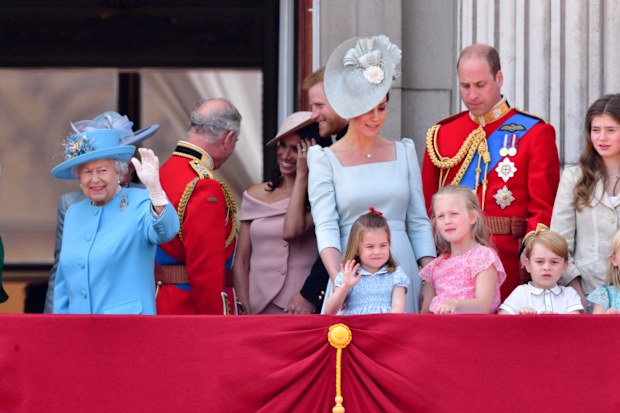 Queen Elizabeth II, Prince Charles, Prince of Wales, Meghan, Duchess of Sussex, Prince Harry, Duke of Sussex, Catherine, Prince William, Princess Charlotte, Savannah Phillips and Prince George on the balcony of Buckingham Palace during the Trooping the Colour parade on June 9, 2018 in London, England.