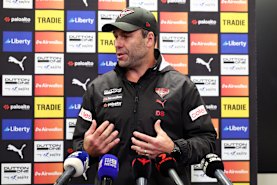 Essendon interim coach Dean Solomon speaks on Thursday, having taken over from former coach Brad Scott.