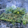 Laplap wrapped with bananas leaves  and cooked on coals, Tanna, Vanuatu.