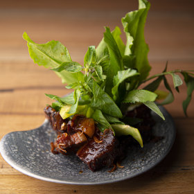 Sticky aged pork with Thai herbs. 