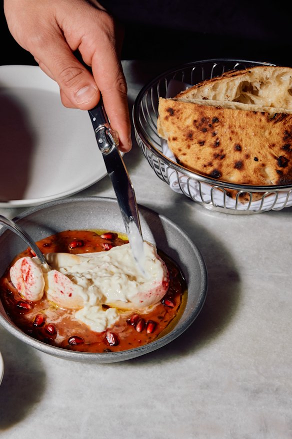 Burrata, agrodulce and pomegranate with made-to-order flatbread.