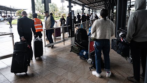 The queue at the new Uber pick-up zone at Sydney Airport’s international terminal.