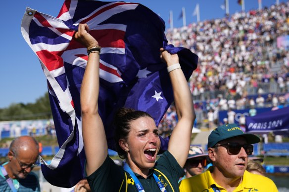 Jess Fox celebrates at her sister Noemie’s medal ceremony.