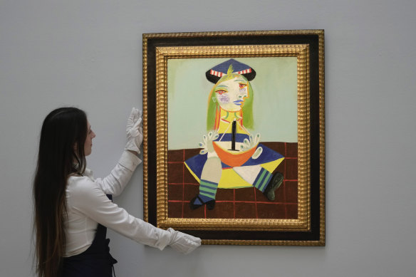 The painting “Maya” by Spanish painter Pablo Picasso in 1938, on display at Sotheby’s in London in February.