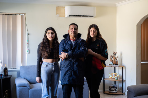 Aubrey Roe with his daughters Kylah and Adamma in their home in Lynwood.