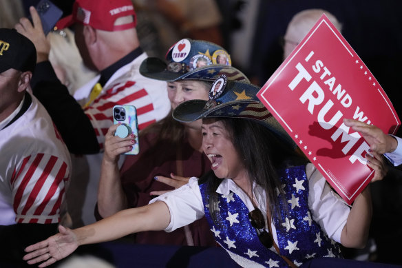 A supporter reacts after former US president Donald Trump spoke at his Mar-a-Lago estate just hours after his arrest.