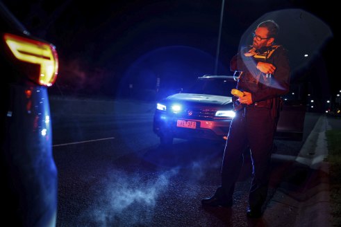 Sergeant Richard Clayton pulls over a car as part of Operation Trinity.