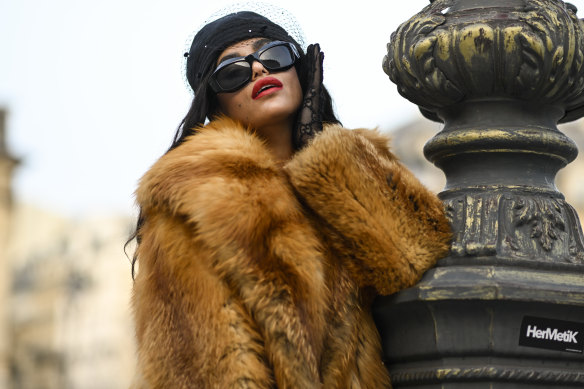 Big sunglasses, big fur, big attitude. The mob wife trend seen at Paris Fashion Week in September.