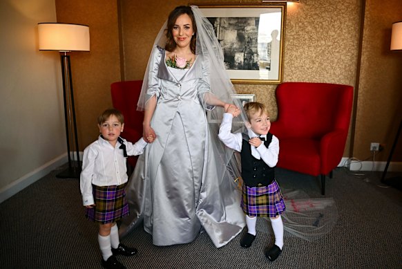 Stella Assange with her sons Max and Gabriel before driving to Belmarsh prison to marry Assange.