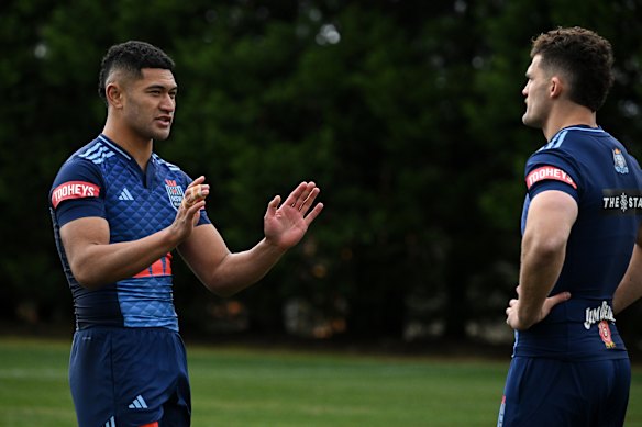 Isaiya Katoa talks with Nathan Cleary in Blues camp.